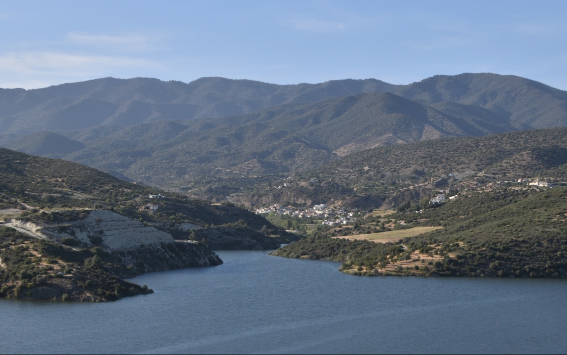 The village of Akrounta in its valley, above the Germasogeia reservoir, with the Troodos foothills behind